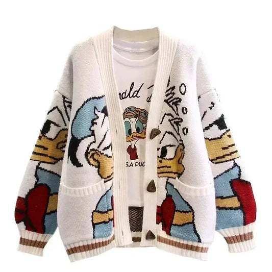 a white sweater with cartoon characters on it