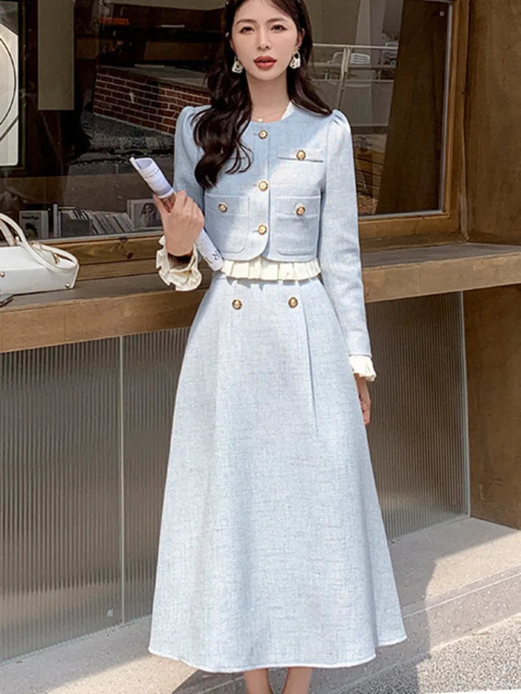 a woman standing in front of a store window