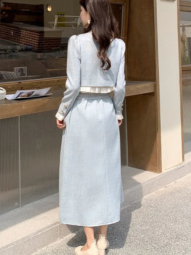 a woman standing in front of a store window