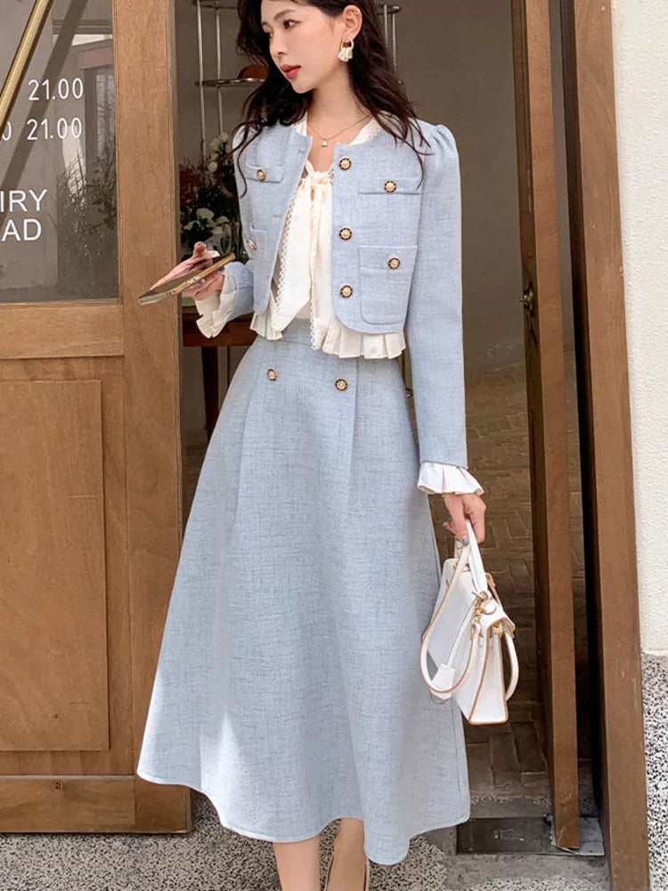 a woman standing in front of a wooden door